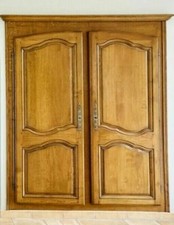 Façade de placard de style Louis XV en chene massif   XX siècle