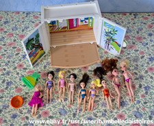 Polly Pocket fashion , lot de 9 poupées vendu avec  terrasse vacances playmobil