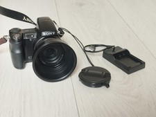 APN / Sony DSC H9 + chargeur + 2 batteries + carte mémoire