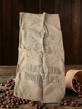 Ancien sac en toile de jute vintage, usure et trous liés à l’âge, déco rétro