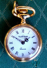1 montre dame pendentif -VILLEMIN REGNIER- plaqué or à quartz avec motif cygne