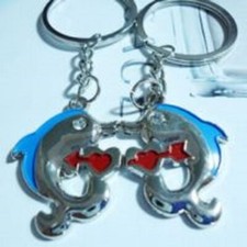 2  Porte cles charm dauphin, les 2