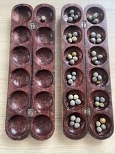 Ancien awalé en bois