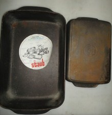 énorme plat fonte STAUB et son petit frère, le grand n'a pas servi, l'autre peu