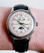Montre Felca automatique triple date phase de lune Felsa 693 Bidynator