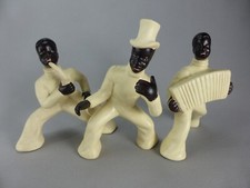 SET DE 3 BOUTEILLES JAZZMAN SAXO TROMPETTE EN CERAMIQUE DE STYLE ART DECO 958