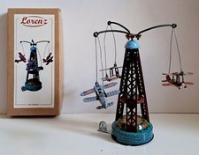LORENZ. JOUET MECANIQUE A RESSORT MANEGE CARROUSEL 3 AVIONS REEDITION PAYA 