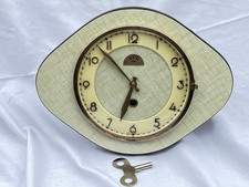 Pendule murale FFR en formica mouvement mécanique 1950-1960