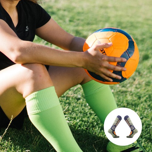 Une paire chaussettes - une,