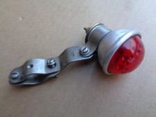 Occasion petit feu arrière avec patte de fixation au cadre , pour vélo vintage .