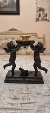 Unique French dark bronze Candle holder With Two cherub puttos holding it