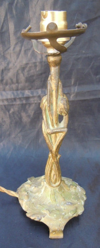 Lampe bronze decor vegetal