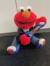 Peluche doudou Rock Guitare Elmo TYCO Preschool Toys