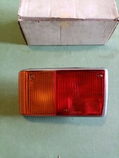 PEUGEOT 104  Feu AR gauche complet QUILLERY ( Entourage gris métallisé ) 