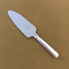 pelle à tarte coupante