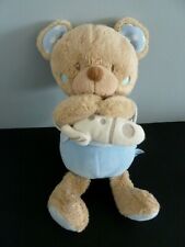 *. DOUDOU OURS TEX BABY MUSICAL MOON BLEU FUSEE BLANC DANS LES BRAS 26cm TTBE