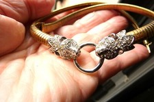 Magnifique collier tubogas a têtes de panthère