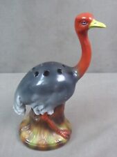 PIQUE-FLEURS en porcelaine, à