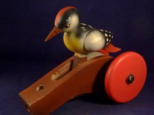 Ancien jouet jeu en bois animé pivert oiseau pousser Très bel état