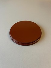 socle rond peint en marron