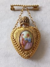 ANCIENNE BROCHE. FLACON DE PARFUM À CARTOUCHE. DEBUT 1900. LIMOGES.