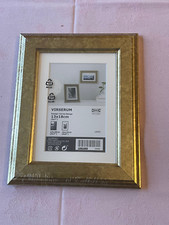 Cadre en bois doré vieil or