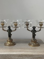 Paire de chandeliers satyres