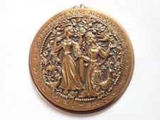 Ancienne médaille pince à