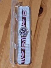 Montre Swatch Puzzle Motion Interprétation + Boîte - État Neuf (Boîte Bon État)