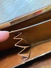 Porte monnaie ancien, en cuir de porc.