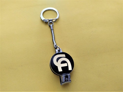 Ancien porte clés - logo, ca