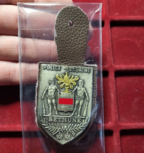 128 pucelle insigne - insigne, /