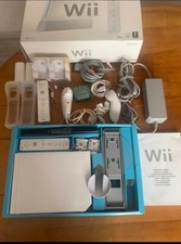 console Wii + 4 jeux et