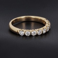 Alliance demi-tour en or jaune 750/ème et diamants - B10196