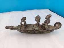 Bronze africain : pirogue à