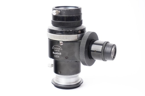 Adaptateur pour microscope