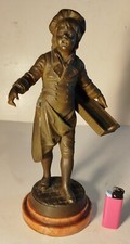 statuette XIXe enfant vendeur