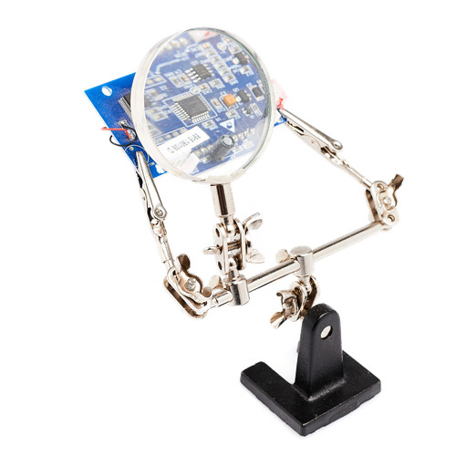 Troisième main avec loupe - troisième,