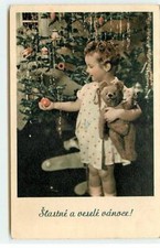 Enfants - Stastné a veselé vanoce - Fillette portant un ours en peluche, décora