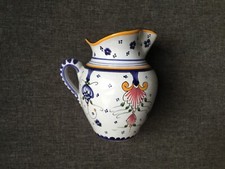 Petit pichet pincé faience