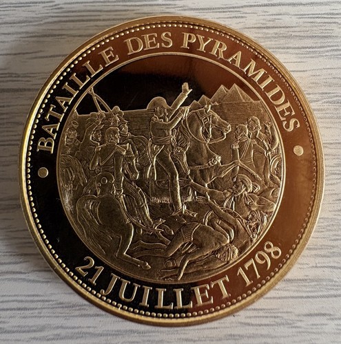Médaille dorée carats - 24,