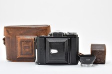 Presque comme neuf zeiss - comme, neuf+]