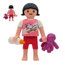 Playmobil figurine fille rose