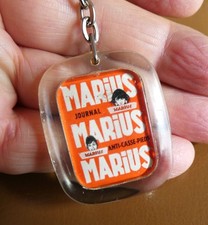 Ancien porte clé Journal BD Marius Anti Casse Pieds Dessin Humoristique N° 2.