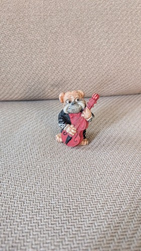 Figurine animal musicien chien