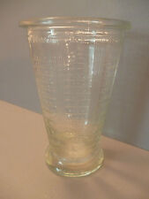 Verre doseur ancien en verre