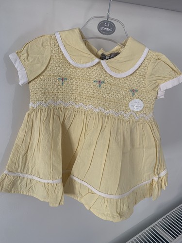 Robe jaune brodée bébé
