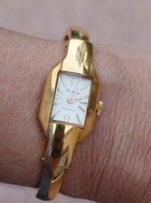 Montre vintage femme plaqué or bracelet rigide SLAVA - 17 Jewels