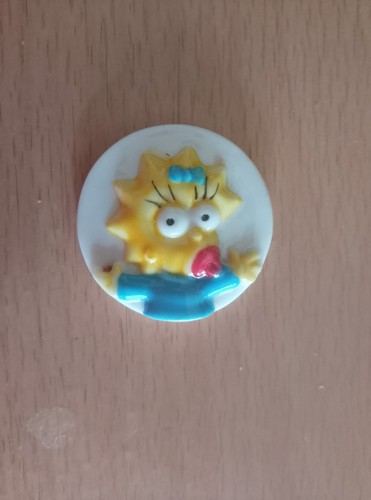 Fève les simpsons maggie