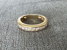 Bague en or jaune 18 carats et diamants - demie alliance américaine